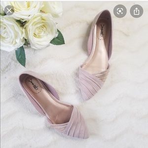 Pastel pink pointed flats